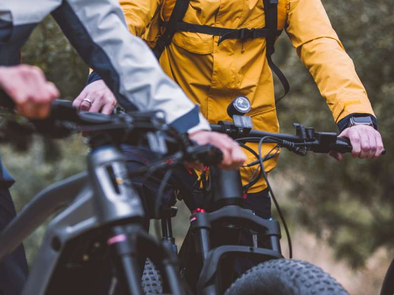 cyclist walking with their ebike