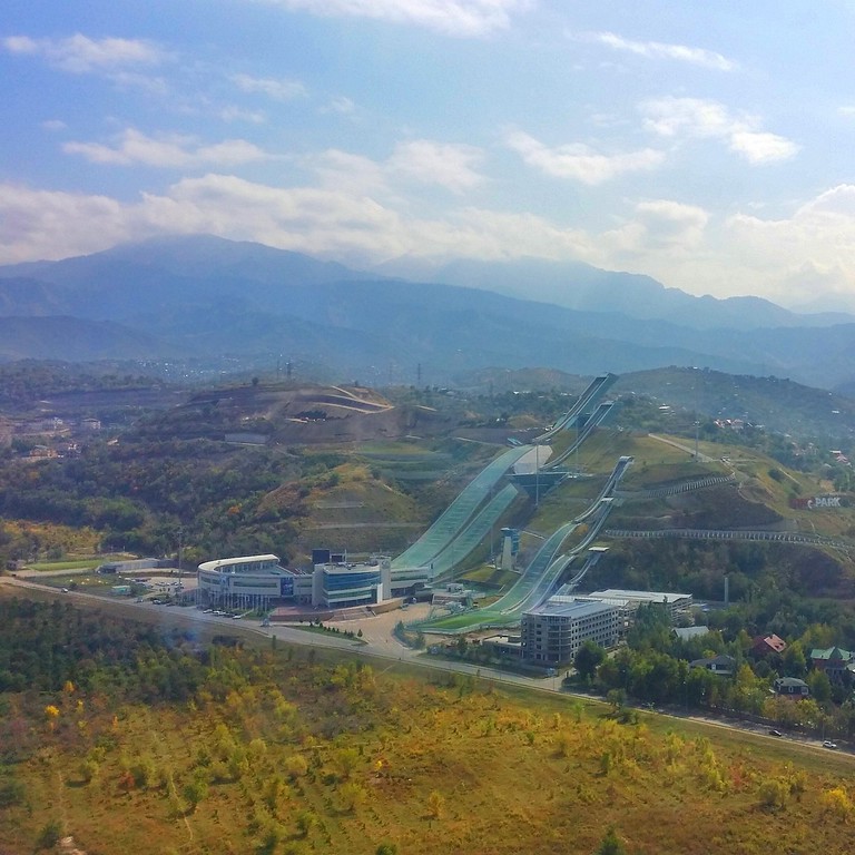 Ski jump and Tian Shan Mountains seen from the Ritz-Carlton in Almaty, Kazakhstan. 