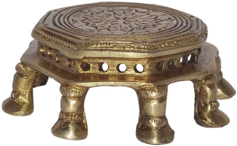 Add a brass offering table to your home for a real Indian feel. 