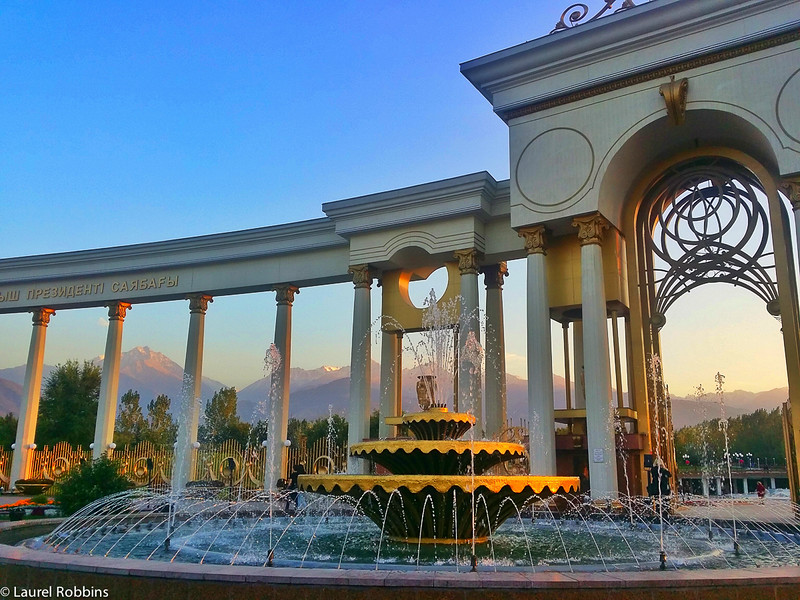 Water fountain and Tien Shen Mountain backdrop at First Presiden'ts Park in Almaty Kazakhstan.Almaty Kazakhstan