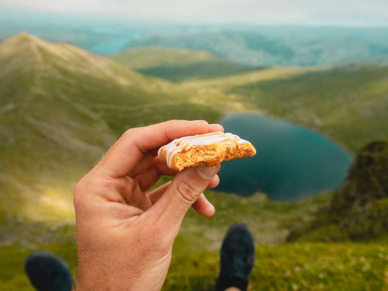 hiker eating a snack