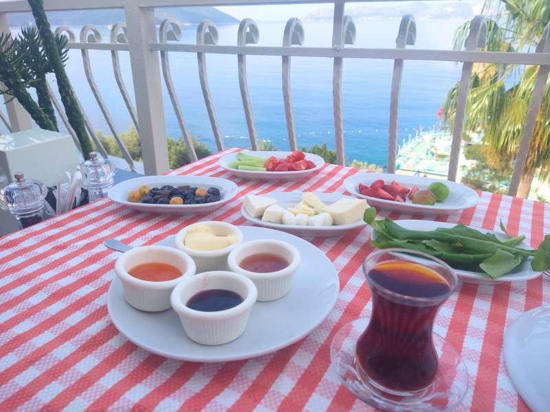 eating breakfast while sea viewing after west lycian way hiking tour