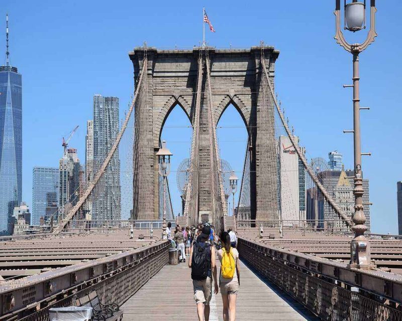 The Brooklyn Bridge pedestrian walk is the perfect place for a stroll. It offers amazing and free views of the NYC skyline.