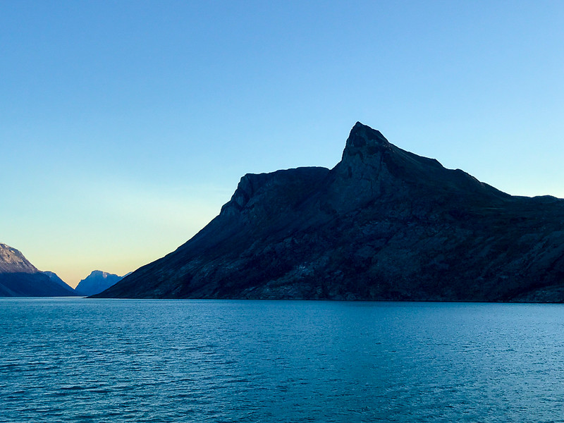 You'll see some incredible mountain views while cruising through the waters of Greenland on your Arctic adventure.