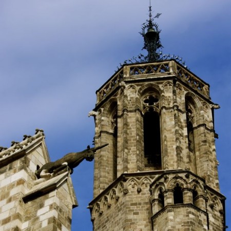 Strange figures that line the cathedral wall in Barcelona's Gothic Quarter