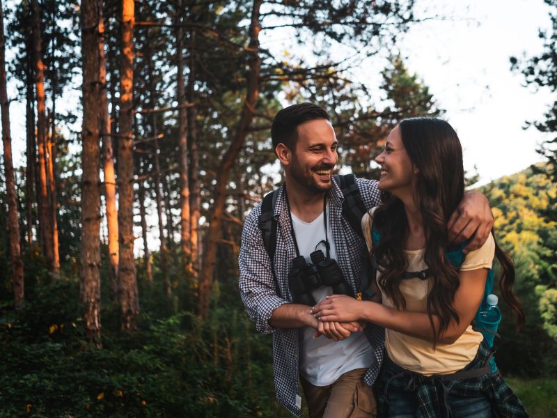 happy couple hiking together