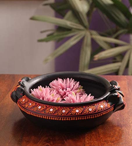 A terracotta flower pot is the perfect addition to your Indian inspired decor. 