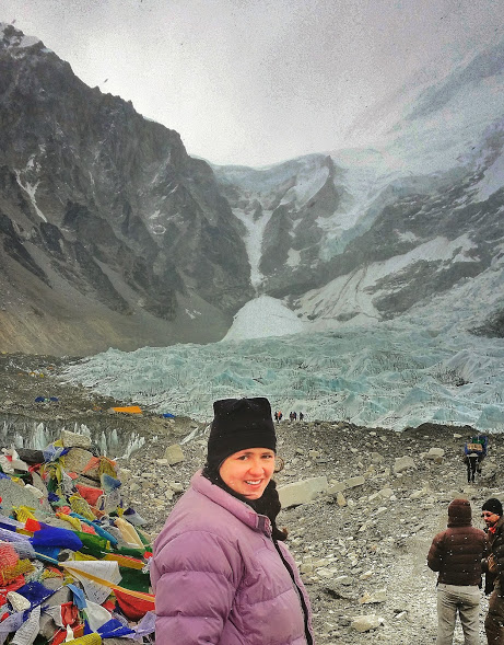 Laurel arriving at Everest Base Camp after 8 days of trekking.