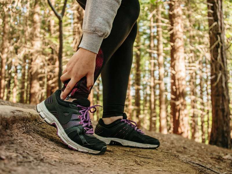 hiker feeling pain on its foot