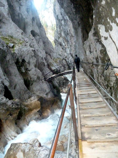 Walking along the gorge on a wooden platform.