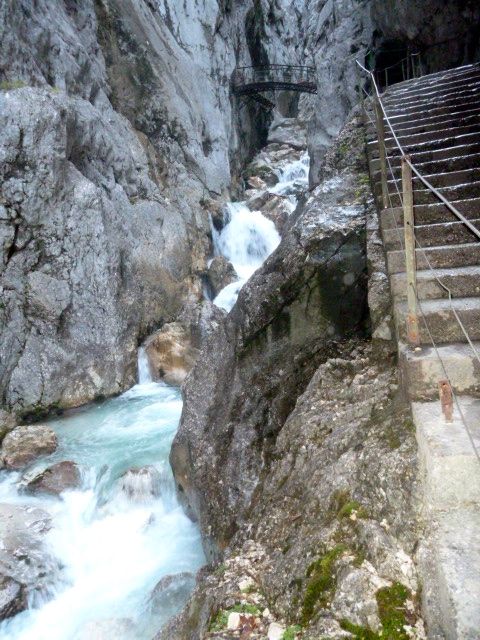 Stairs and a bridge are part of the walkway through the gorge