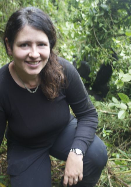 Me posing with a silverback of the Sabyinyo troop in Volcanoes National Park, Rwanda