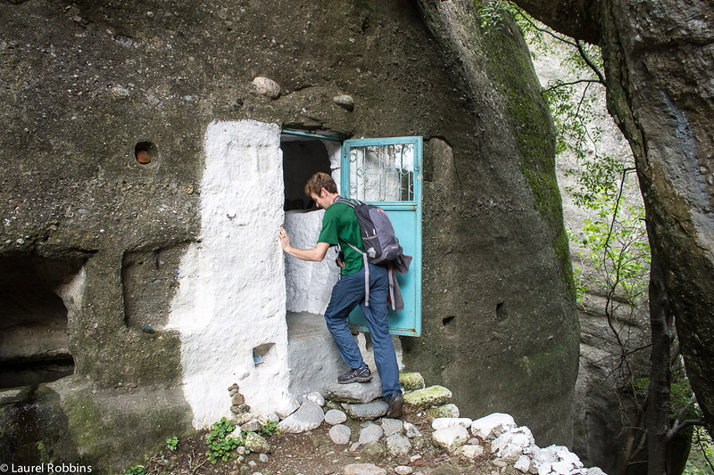 Entering the cave en route to the Holy Spirit in Meteora Greece 