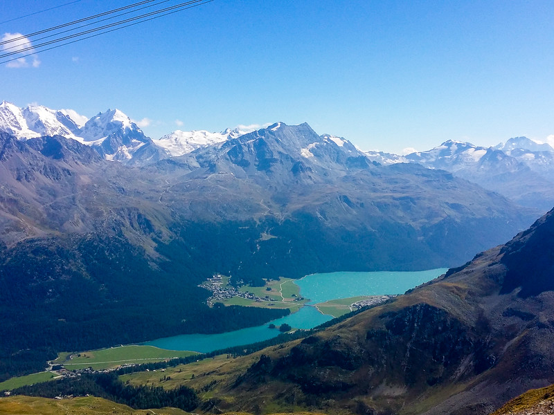 Glacier-capped peaks and iridescent blue lakes make for dramatic scenery in the Engadin mountains near St Moritz Swizterland