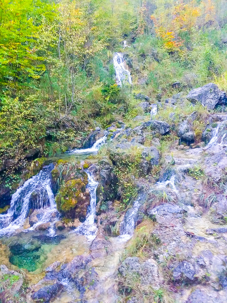 Hikers can see cascading waterfalls when hiking Enipeas' Gorge in Mount Olympus National Park in Greece