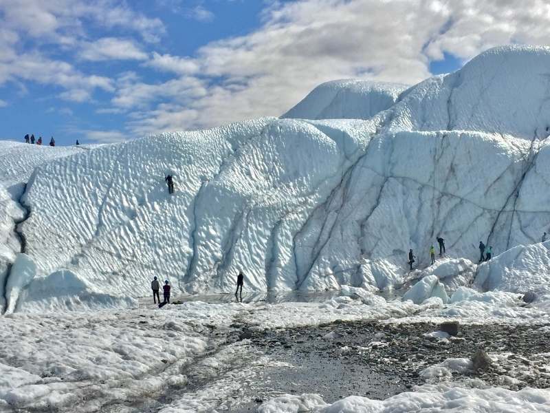 example of mountaineering vs hiking, trekking and mountaineering. Requires special equipment like crampons, ice axes and ropes to climb terrain that would otherwise be unaccessible.