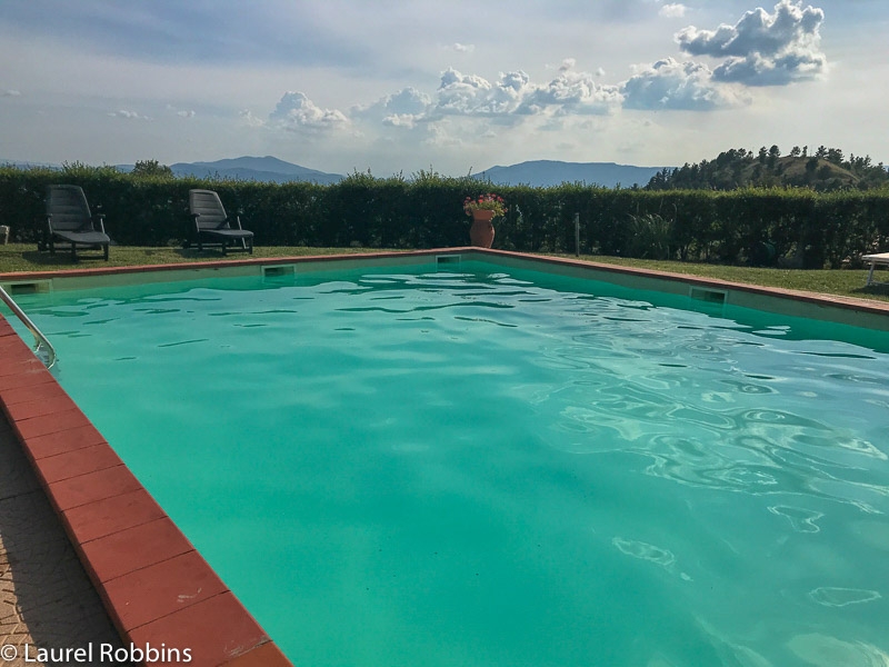 The Podere Belvedere in Tuscany has a swimming pool with fantastic views.