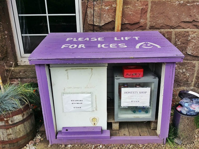 Honesty box along a hiking trail in Scotland.