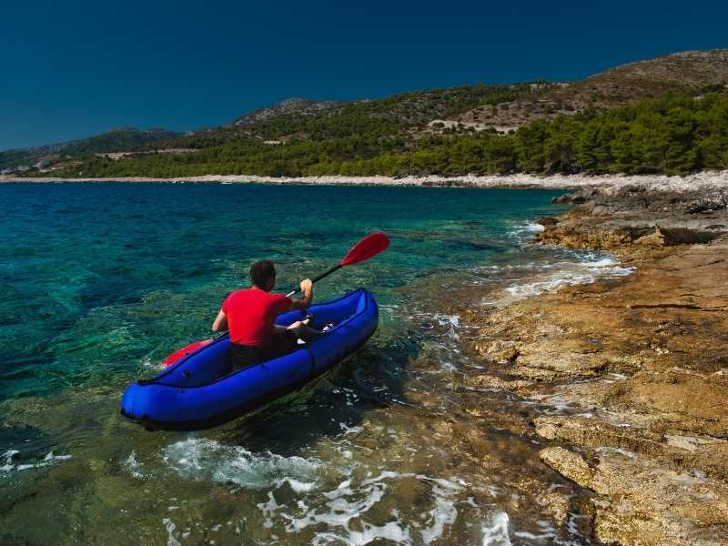 Kayaking during self-guided hiking tour in Croatia