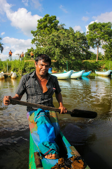 Local hired to row us across the reservoir at tHiriwadunna Village near Habarana.