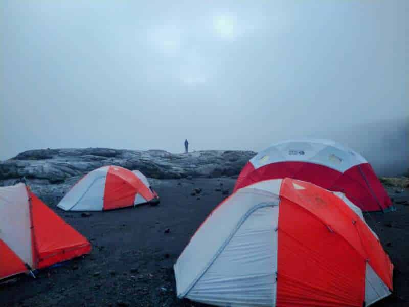 hikers camping at the top of kilimanjaro mountain