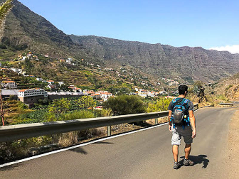 hiker on the road to Hermigua.