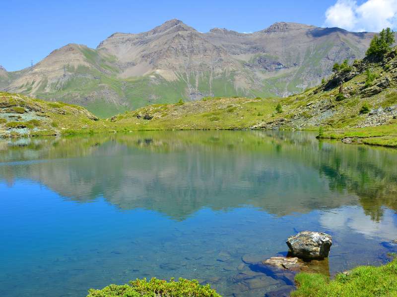 Lago de Loie makes for a nice rest stop on your Gran Paradiso Trekking tour