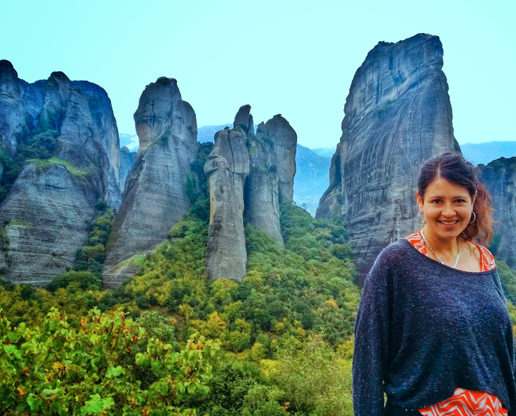 Me feeling very small in front of the huge sand-stone towers at Meteora.