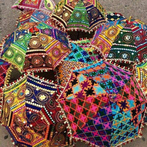 Hand embroidered in India, these decorative umbrellas are a great addition to your Indian decor. 