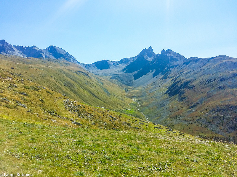 Trail from Muottas Muragl to Lej Muragl, a scenic hike in the Engadin mountains near St. Moritz, Switzerland.