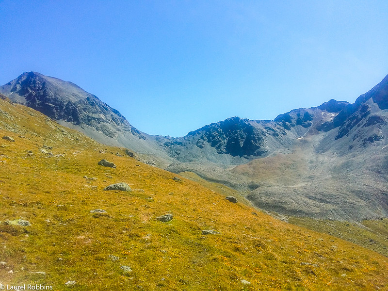 Trail from Muottas Muragl to Lej Muragl, a scenic hike in the Engadin mountains near St. Moritz, Switzerland.