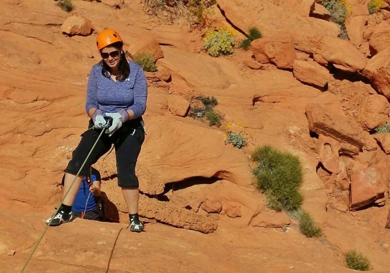 Adventure travel blogger Laurel Robbins rapelling. A perfect Staycation idea 