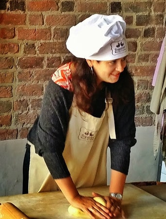 Me at the beginning stages of a very long process of making a St. Martin's Croissant., eaten on St. Martin's Day in Poznan, Poland.