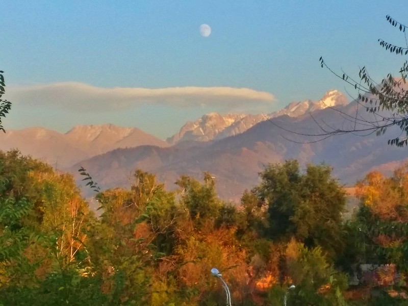 Tien shan mountains as seen from First President's Park in Almaty, Kazakhstan