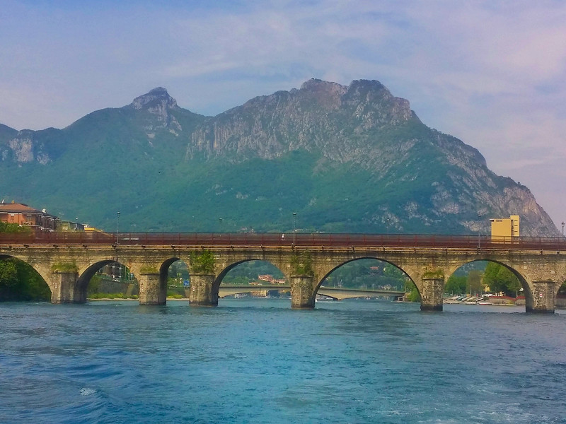 The architecture of this bridge is incredible - notice how no two arches are the same side on Lake Como, Italy.