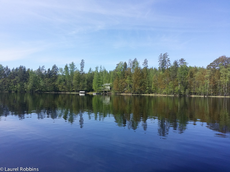 Cottages, dot the shoreline of Lake Saimaa in Savonlinna, Finland