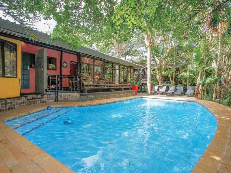 stay in the romantic Umlilo Lodge