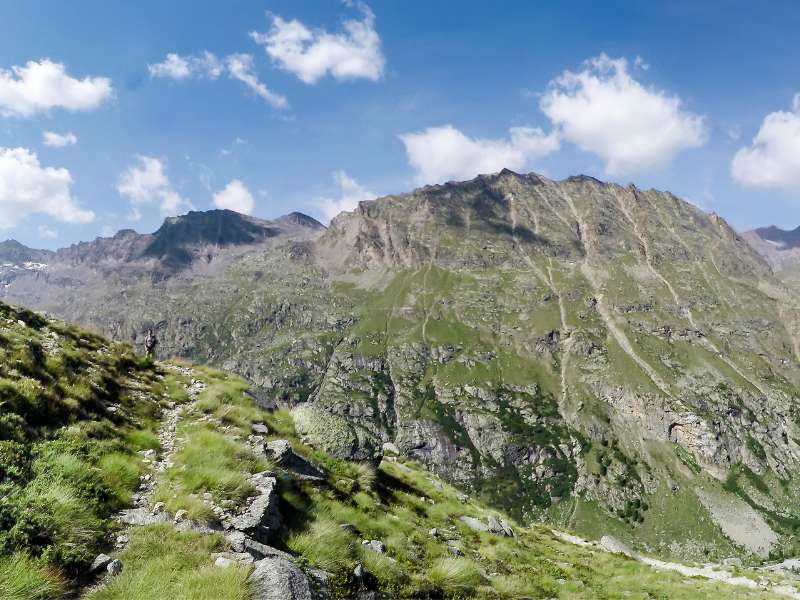 hiker en route to the Vittorio Sella Refugio