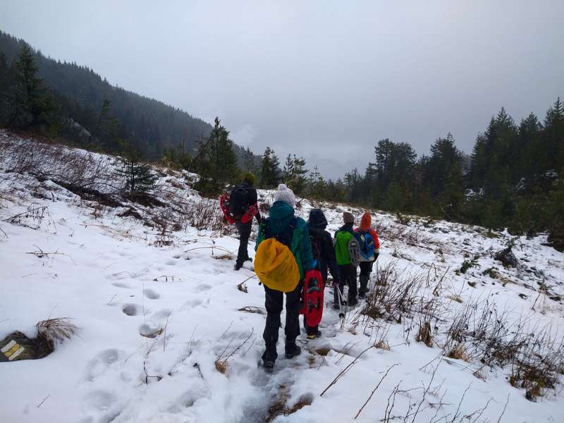 winter hiking with group of friends