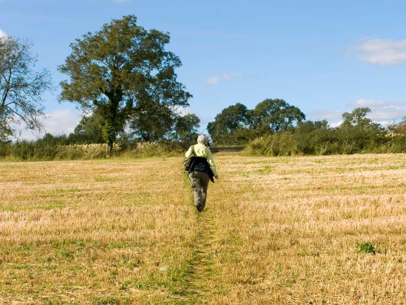 woman following the trail of Cotswold Way