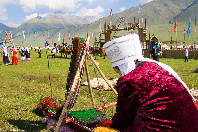 In the gorgeous setting of Kyrchyn Jailoo a Kyrgyz woman weaves.